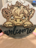 Cow welcome sign